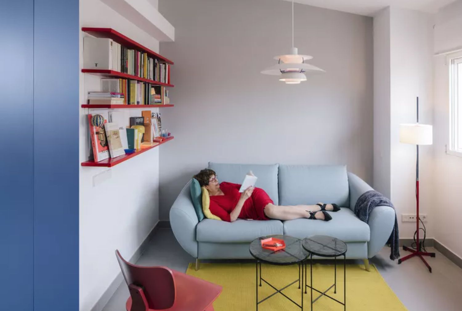 Retiree’s Dramatic Micro-Condominium Renovation Performs With Colour and Gentle